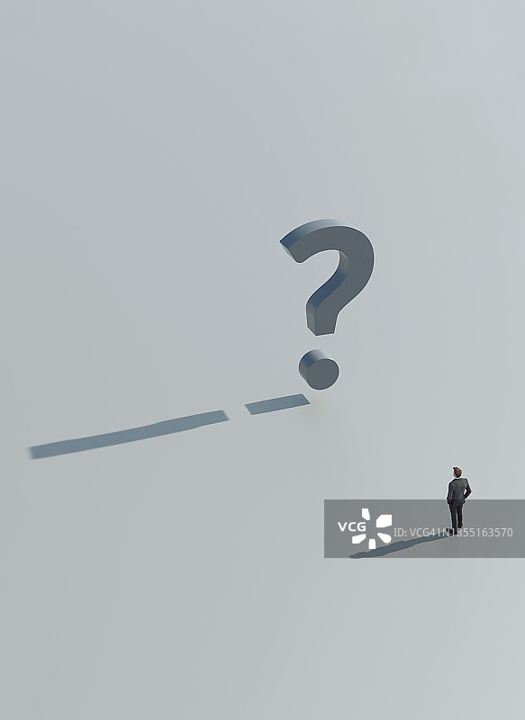 企业家站在巨大的问号前图片素材