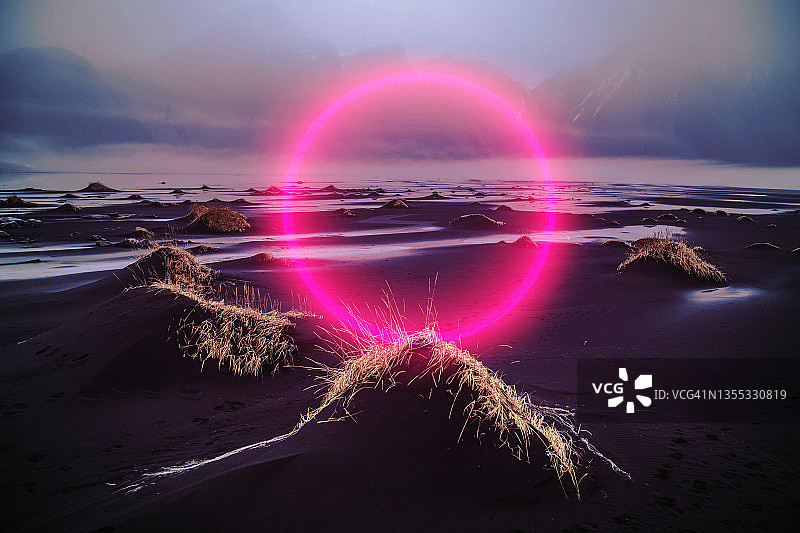 冰岛壮丽景色中发光的红色数码圆圈图片素材