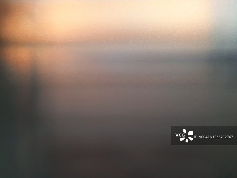 磨砂玻璃后的日落图片素材