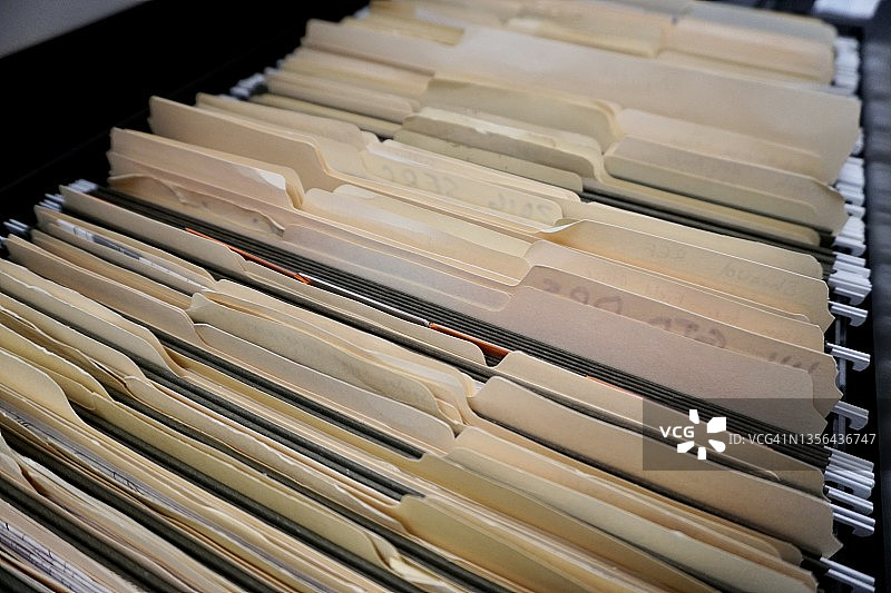 带有文件夹和文档的打开的文件抽屉图片素材