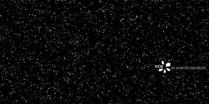 黑色背景上的飘雪图片素材