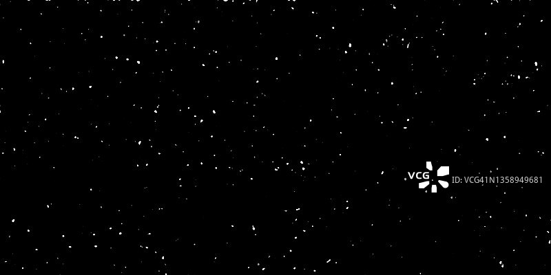 黑色纹理背景上的白色颗粒图片素材