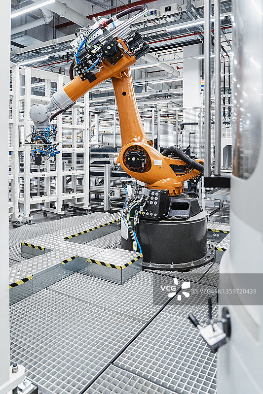 制造业中的自动化机器人手臂图片素材