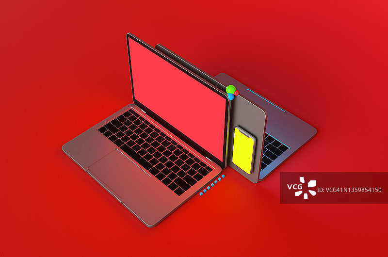 红色背景上的两台笔记本电脑和一部智能手机图片素材