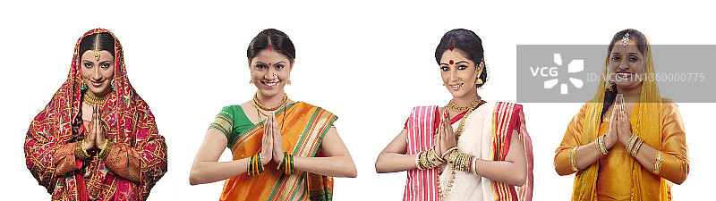 身着传统文化服装的印度妇女合掌致意图片素材