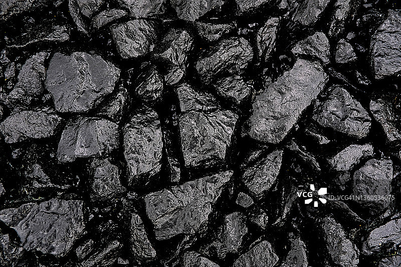 沥青路面施工用灰色碎石背景图片素材