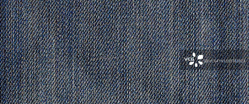 深蓝色牛仔裤纹理和纺织品背景banner图片素材