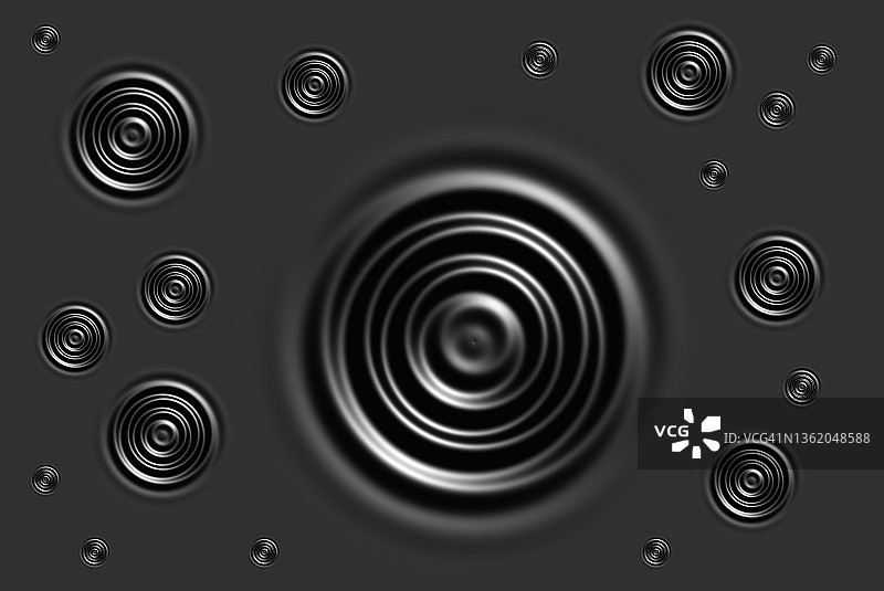 雨滴落在水面产生的同心圆全画幅图片素材