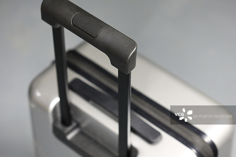 旅行箱上的伸缩把手图片素材