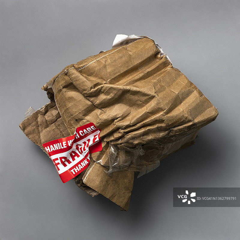 压坏包装上的易碎物品小心轻放标签图片素材