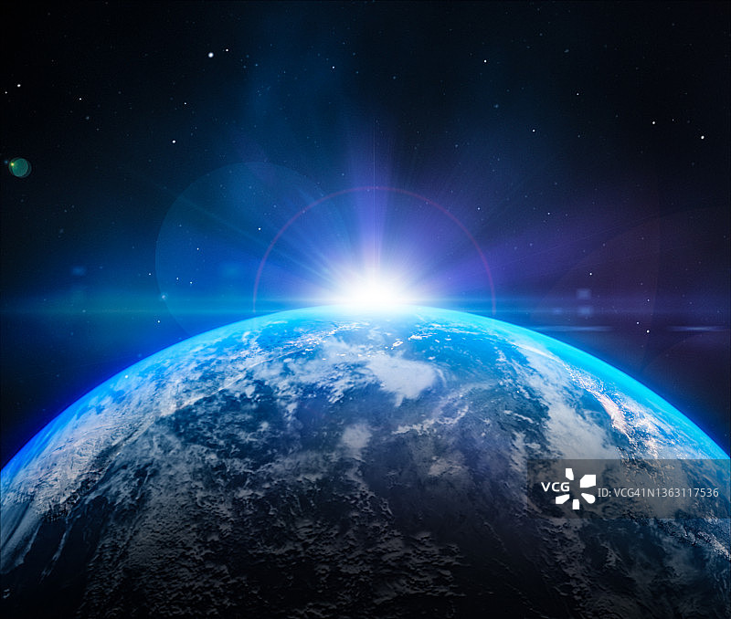 行星与带镜头光晕的上升之星图片素材