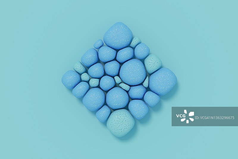 方形的柔软石球，抽象蓝色背景图片素材