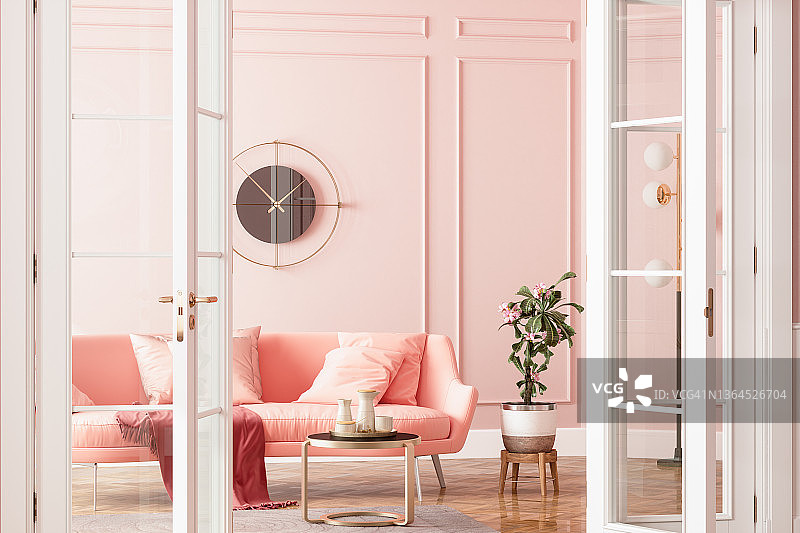 带粉色沙发、盆栽和咖啡桌的客厅入口图片素材