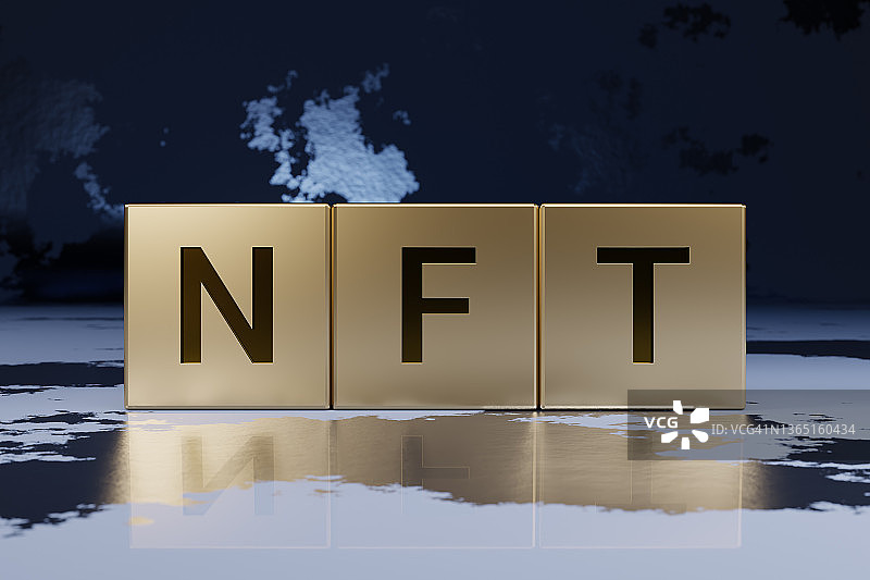 NFT。金色方块上的非同质化代币缩写。图片素材