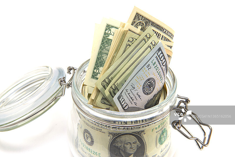 储蓄罐里的美元图片素材