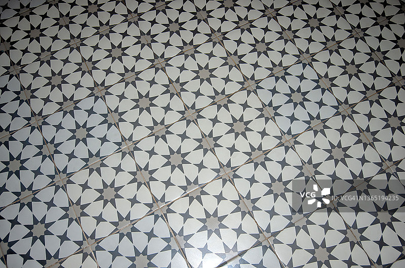 带有灰色星形图案的陶瓷瓷砖地板图片素材