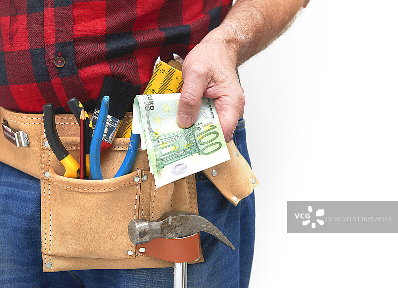 现金支付给建筑工人图片素材