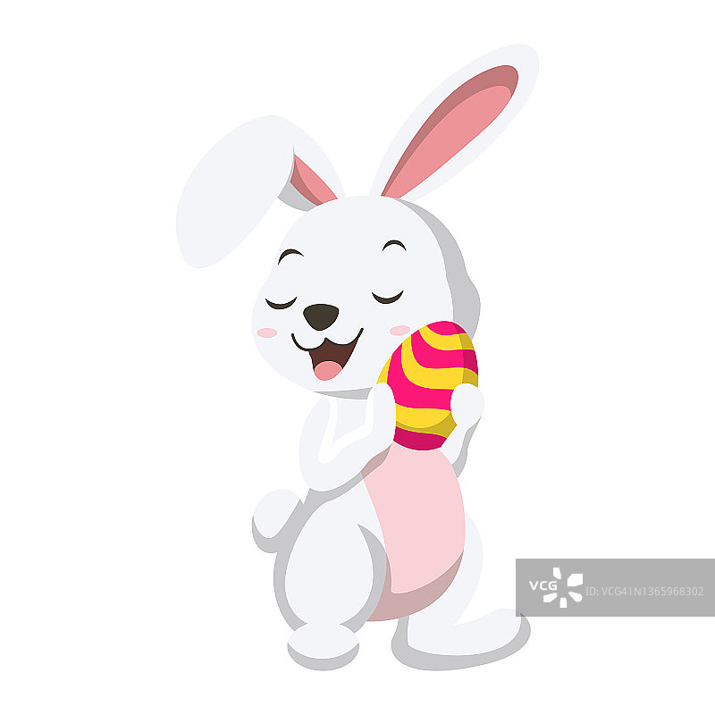 抱着复活节彩蛋的可爱小白兔图片素材
