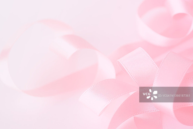 粉色背景上的缎带图片素材