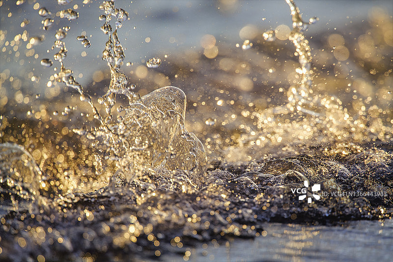 金色蓝色水花和散景光效图片素材