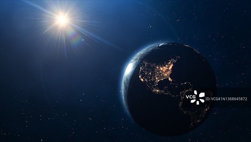从太空看到的地球和太阳：美洲位于地球夜面图片素材