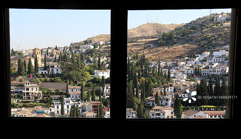 萨克罗蒙特，西班牙安达卢西亚格拉纳达，透过窗户看到的风景图片素材