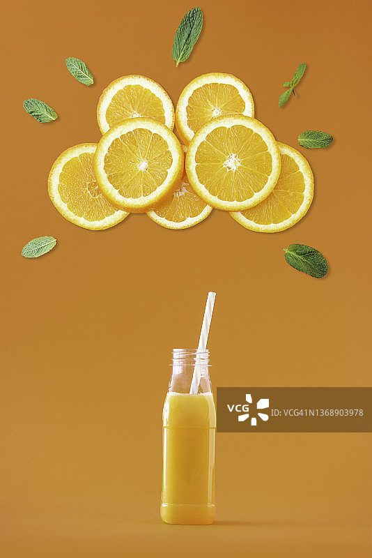 橙色背景上的橙子创意照片图片素材