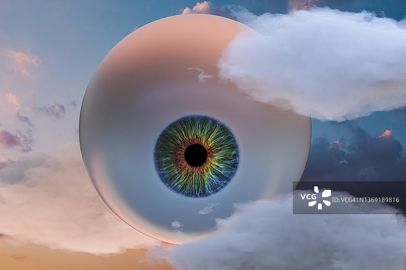 天空中的巨大眼球和云彩图片素材