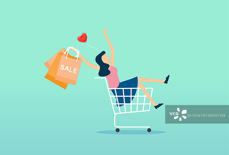 女人对购物感到满意，魅力女性顾客携带购买的商品，女士在商店购买，购物车图片素材