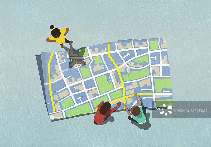 俯视孩子们看大地图图片素材