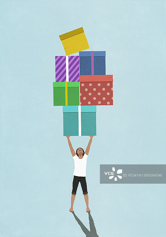 女孩举起一堆彩色礼物图片素材