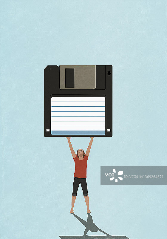 举着软盘的女人图片素材