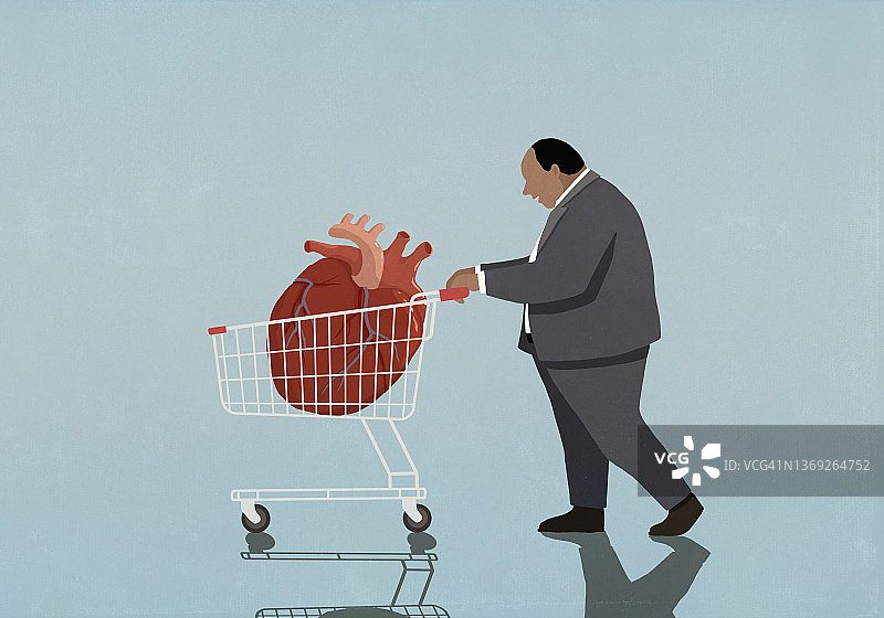 超重的商人推着装有肥大心脏的购物车图片素材