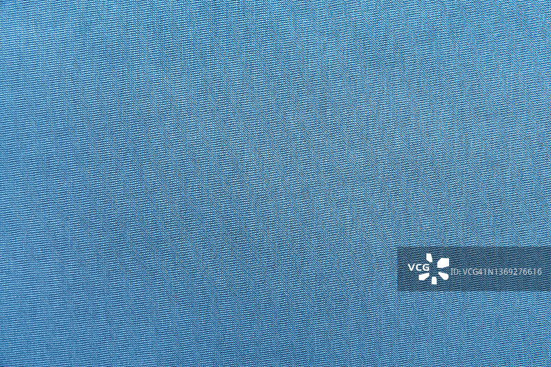 温暖柔软的蓝色布料背景图片素材
