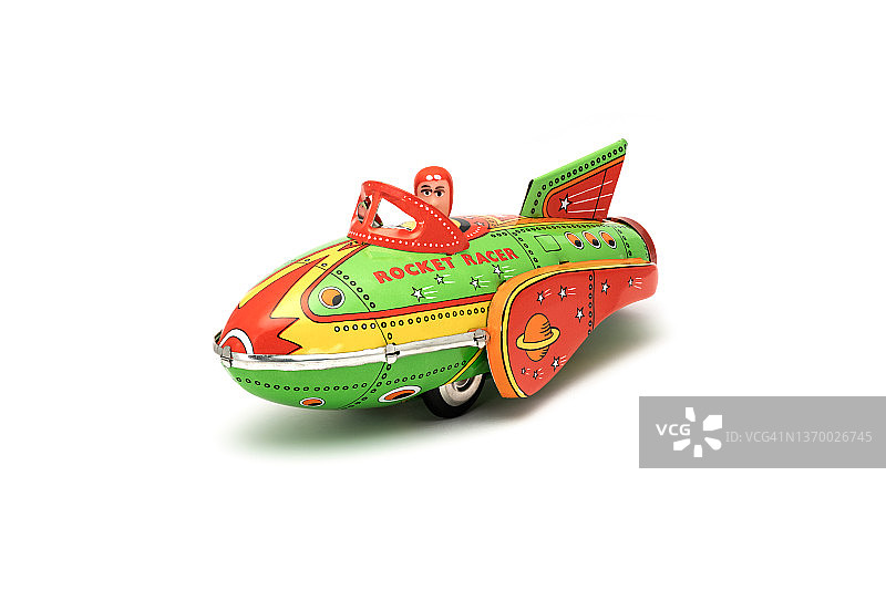 白色背景上的复古火箭玩具和飞行员图片素材