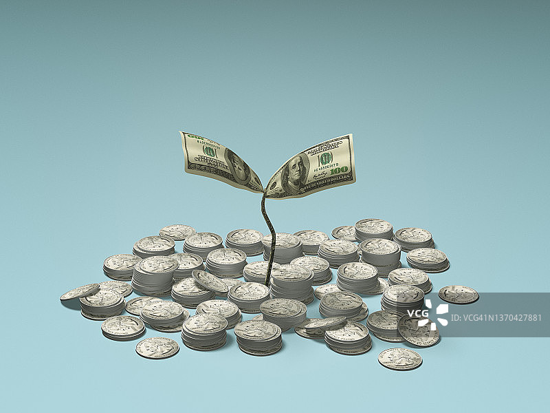 从硬币堆中发芽的纸币（美元）图片素材