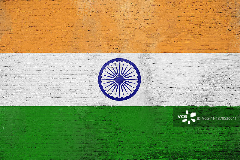 印度国旗绘制在石膏砖墙上的风化照片特写图片素材