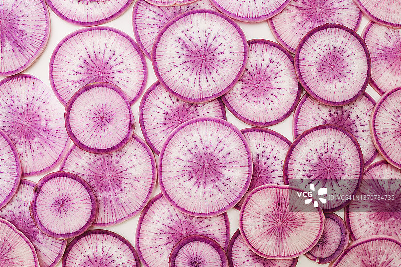 彩色紫色萝卜蔬菜切片特写图案图片素材