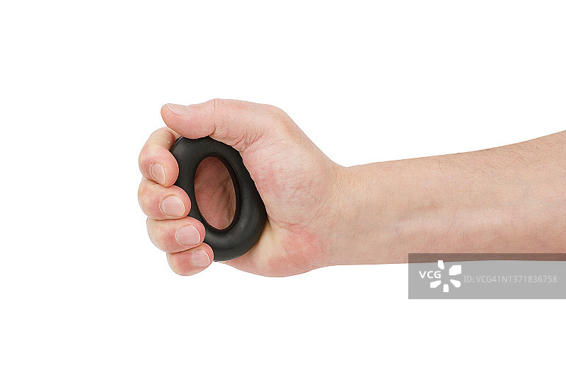 男人手捏黑色橡胶拉力器，白色背景图片素材