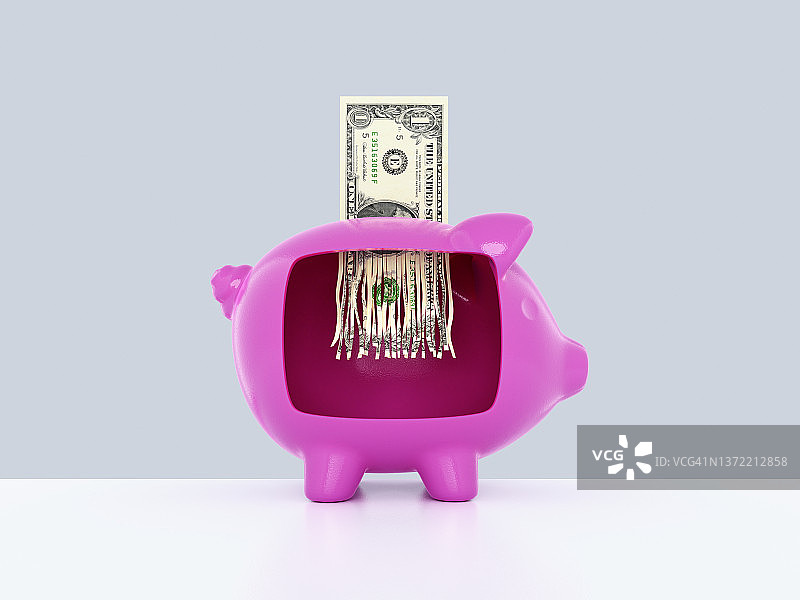 在储蓄罐里被撕碎的美元纸币图片素材