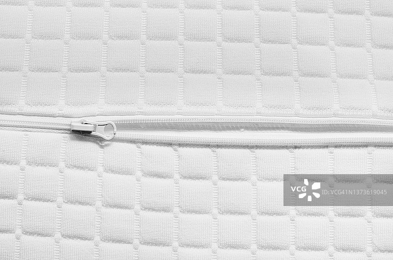白色背景上的白色拉链全画幅照片图片素材