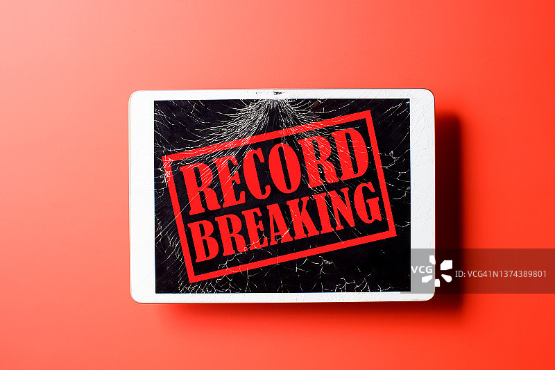 在损坏的数位板上打破纪录图片素材