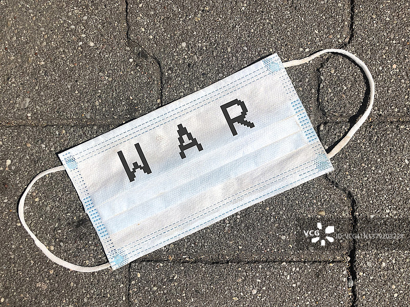 带有“战争”印记的旧冠状病毒口罩图片素材