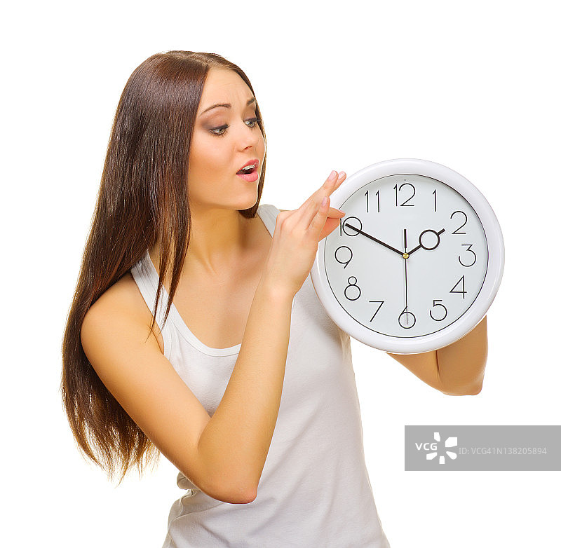 拿着时钟的年轻女孩图片素材