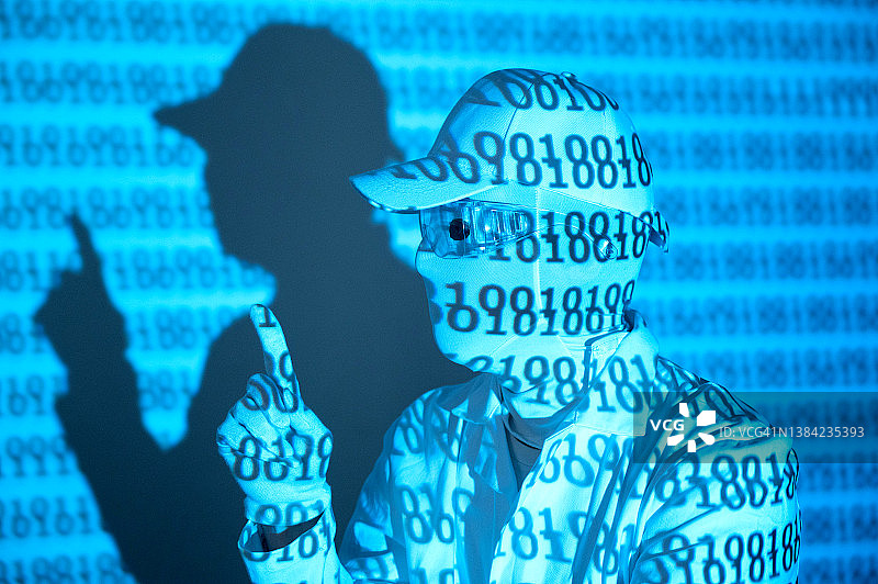 指向二进制代码的匿名人士图片素材