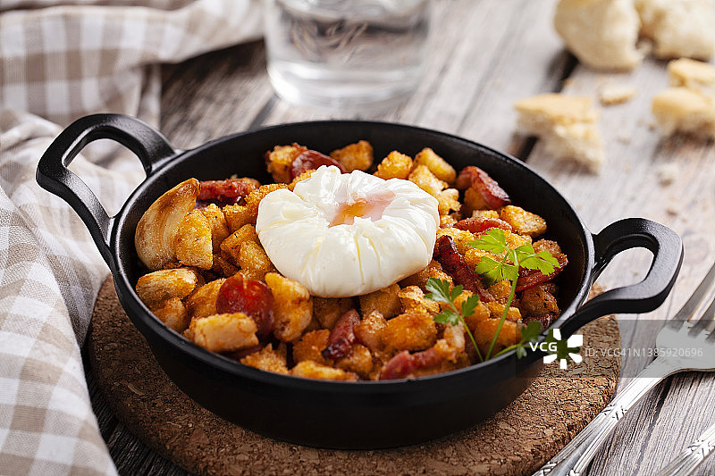 曼查风味米加斯配水波蛋图片素材