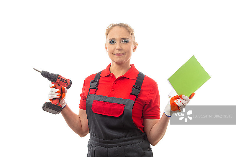 拿着螺丝刀的女 работница图片素材