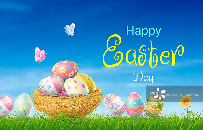 草地鸟巢中色彩鲜艳的复活节彩蛋图片素材