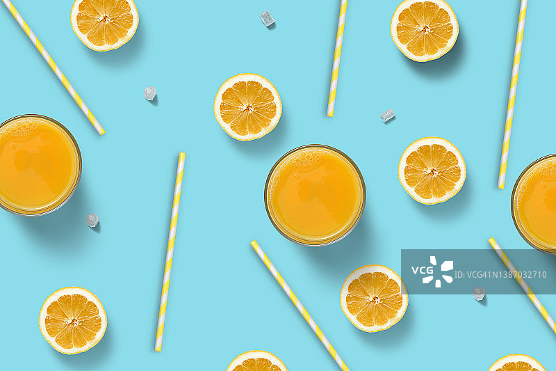 带有橙子片和果汁的橙色框架的俯视角度照片图片素材
