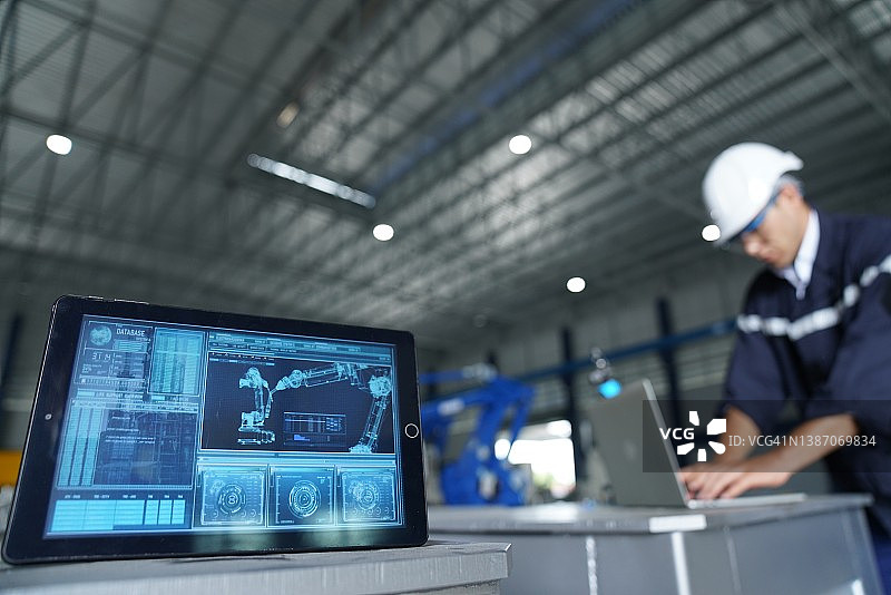 专业开发工程师测试机器人手臂图片素材